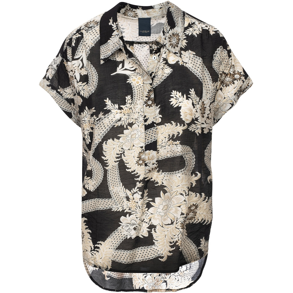 Feminin enkelt sort bluse.