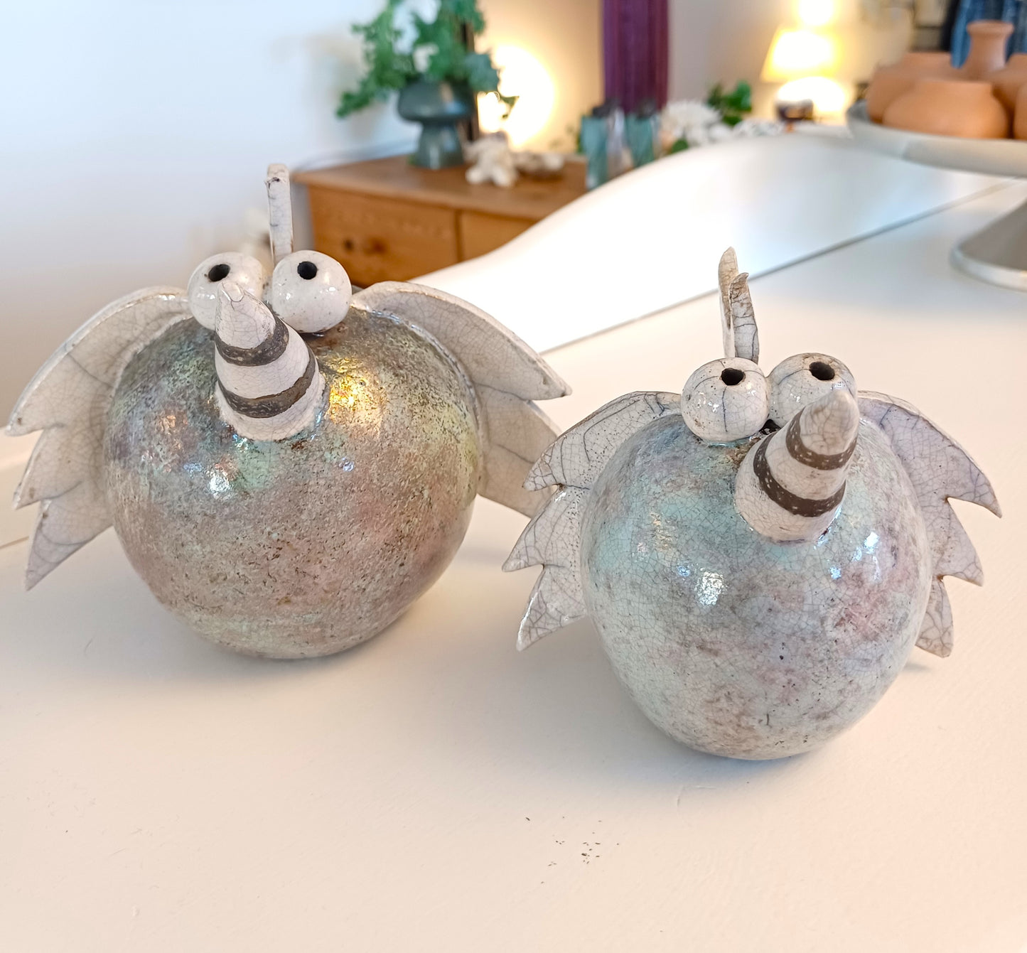 Kongefugle i raku keramik.