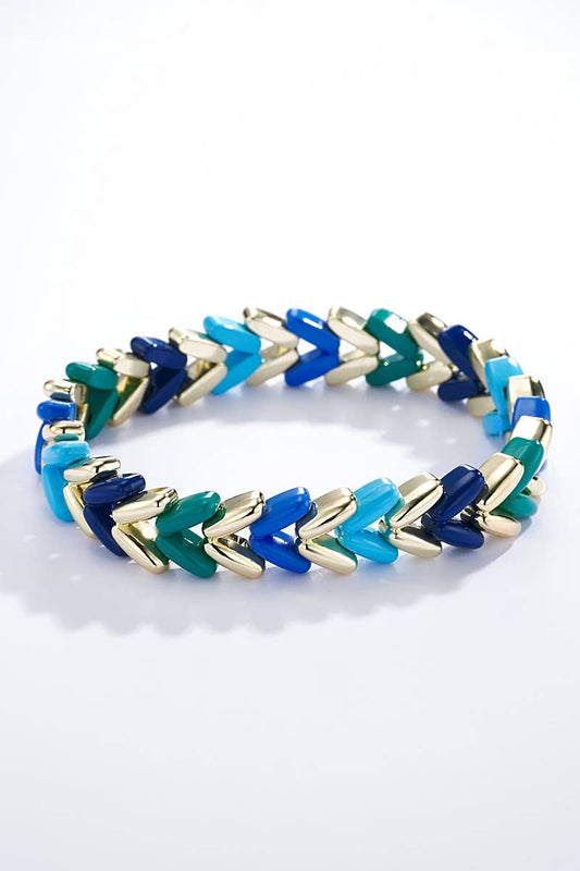 Sødt og elegante perlearmbånd med blå perler i elastiske.