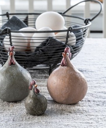 Nordisk høne i terracotta rød.