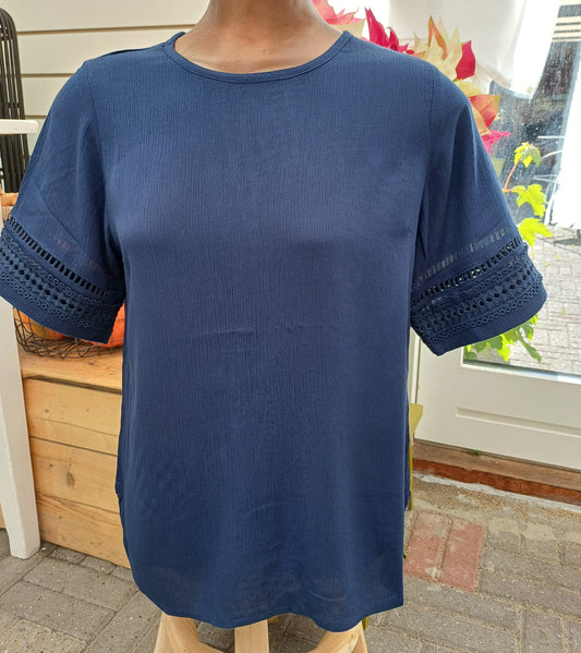Enkelt klassisk navy blå bluse.