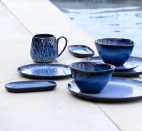 Hav blå keramik krus.